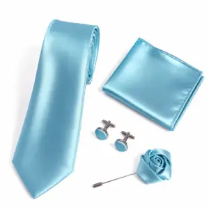 Soft Blue Satin Tie Set with Lapel Flower Pin including a matching pocket square, round cufflinks and fabric lapel flower pin for weddings and formal occasions.