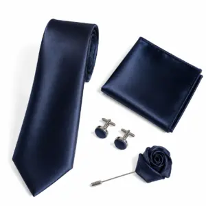 Dark navy satin tie set with matching pocket square, round cufflinks and fabric lapel flower pin for formal occasions.